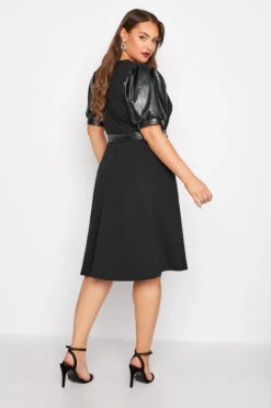 YOURS LONDON Curve Black Leather Look Puff Sleeve Wrap Dress -Plus Size Apparel Shop fcf6f1b7 bf0e 40 161752 C